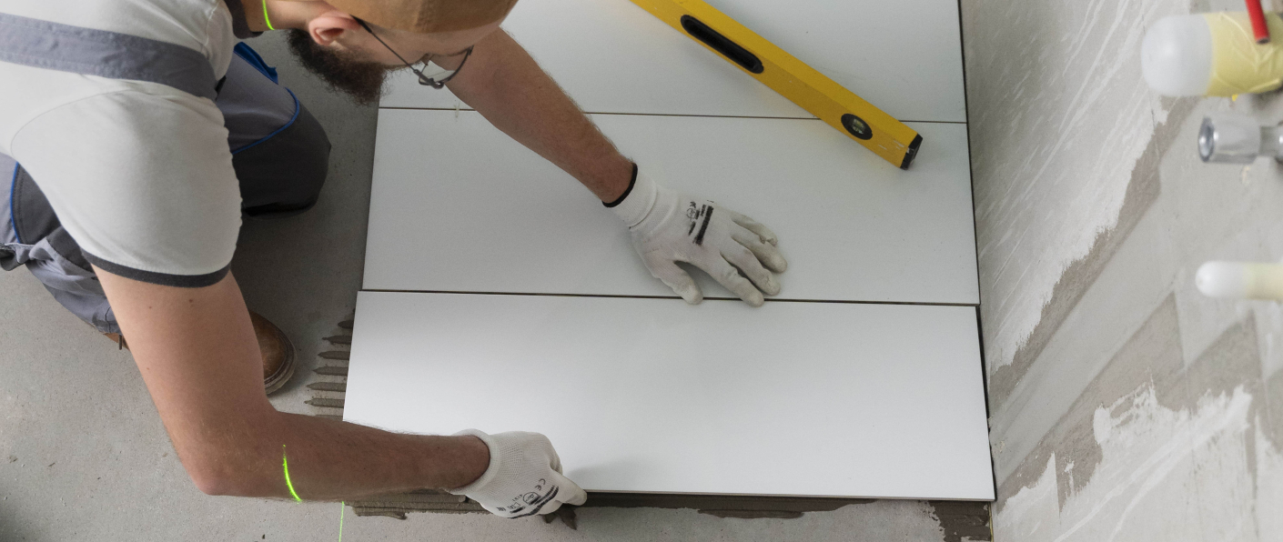 Waterproof tile adhesive application for swimming pool and bathroom tiles