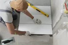 Waterproof tile adhesive application for swimming pool and bathroom tiles